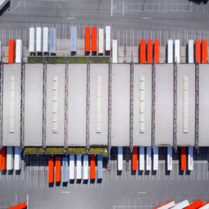 distribution center filled with semi-trucks